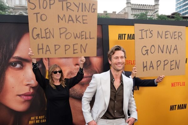 Glen Powell’s Parents Hilariously Troll Him At ‘Hit Man’ Premiere