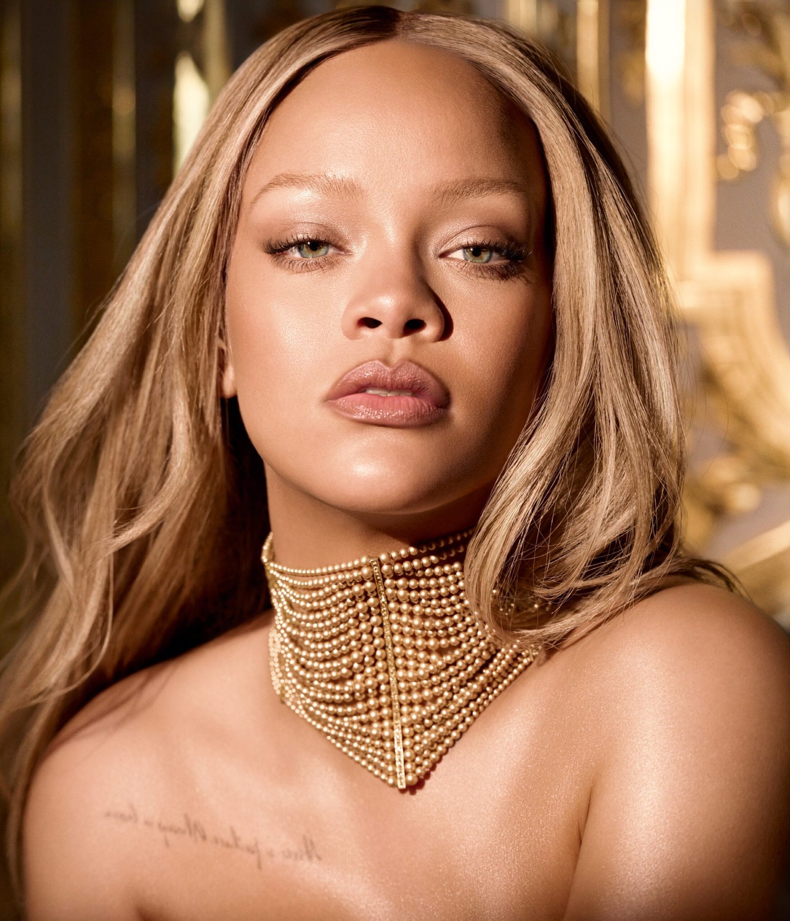 Rihanna Embodies the Iconic J’adore Dior Perfume Bottle in a Golden Corset Dress