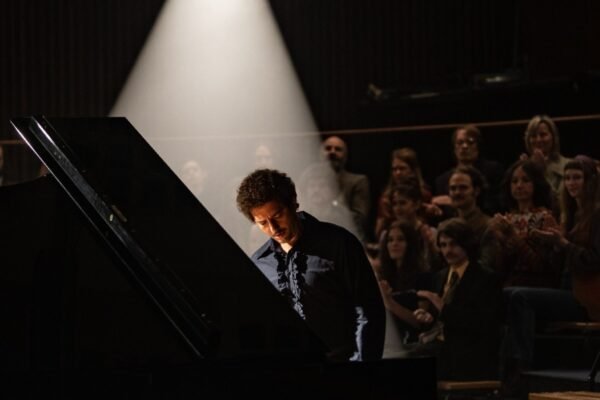 ‘Köln 75’ Review: John Magaro Hits the Right Notes in a Frustrating Music Drama That Marginalizes the Headliner