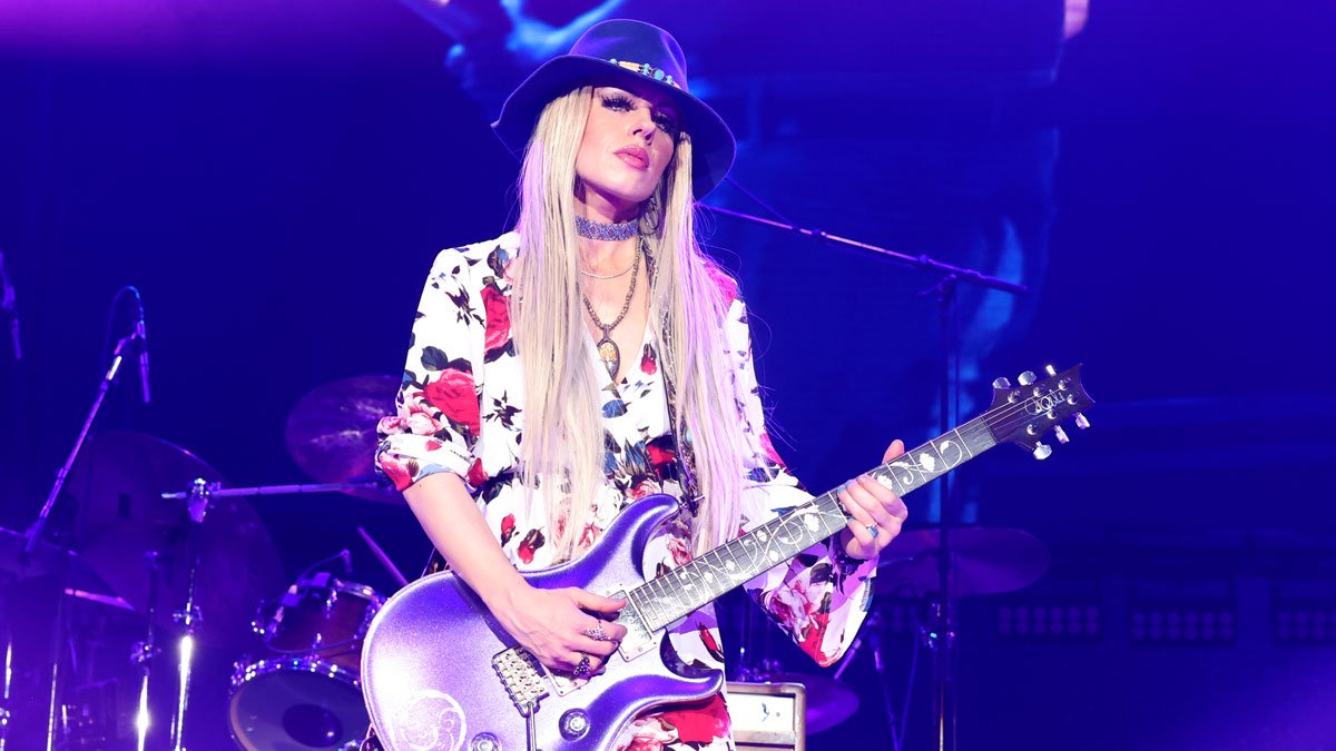 “I called Alice and said, ‘I’m in a lot of pain. I’m not too sure what’s going on’”: Orianthi reveals her agony over the injury that forced her to pull out of her Alice Cooper tour return – and play Back in Black sitting down at PRS’ epic an