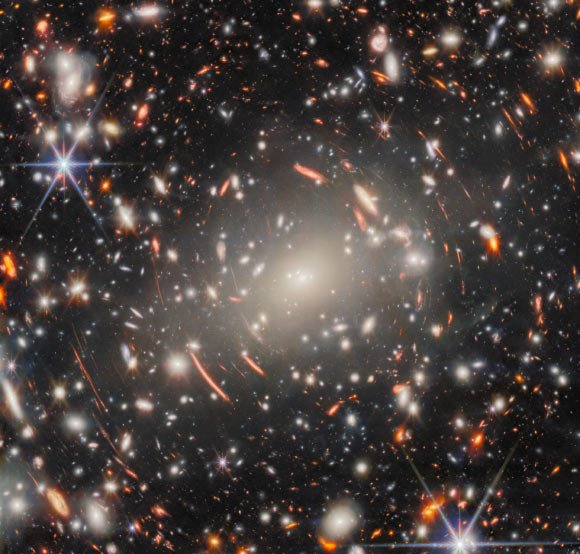 Webb Focuses on Behemoth Galaxy Cluster: Abell S1063